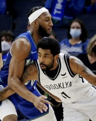  约基奇准三双掘金险胜森林狼稳居西部第一  